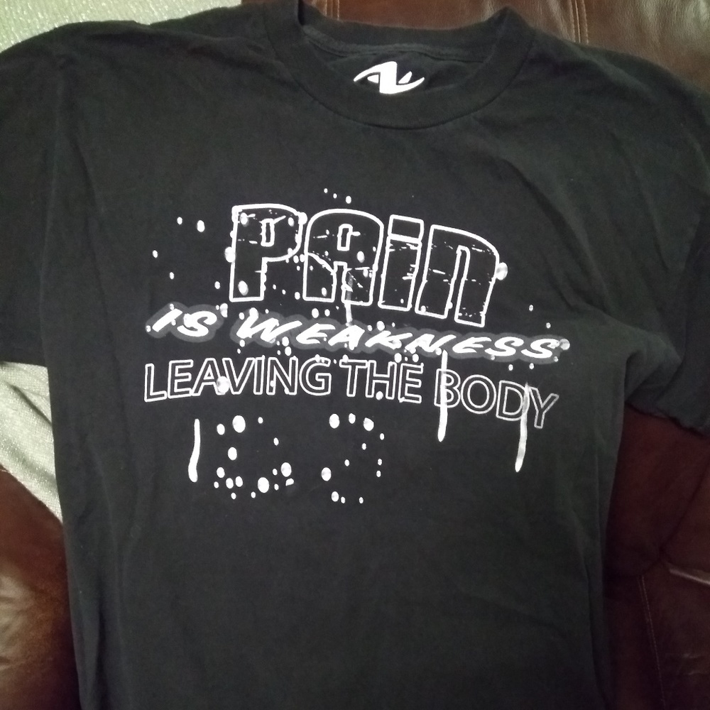 Pain is weakness leaving the body t-shirt